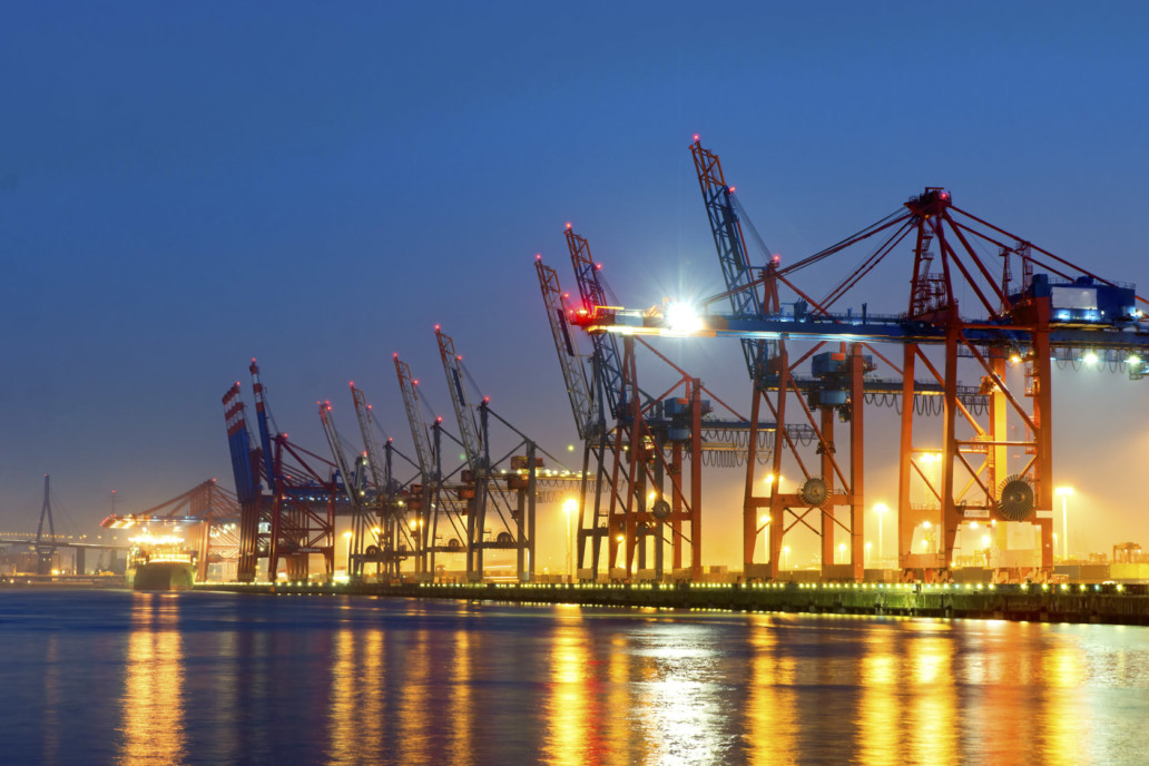 Container cranes in Hamburgs harbour at night